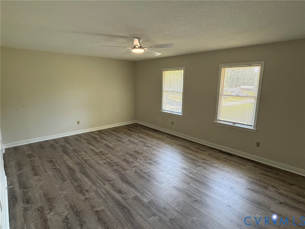 8630 Richmond Road Toano, VA 23168 - Photo 18 of 22 Unit B Primary Bedroom 19x13