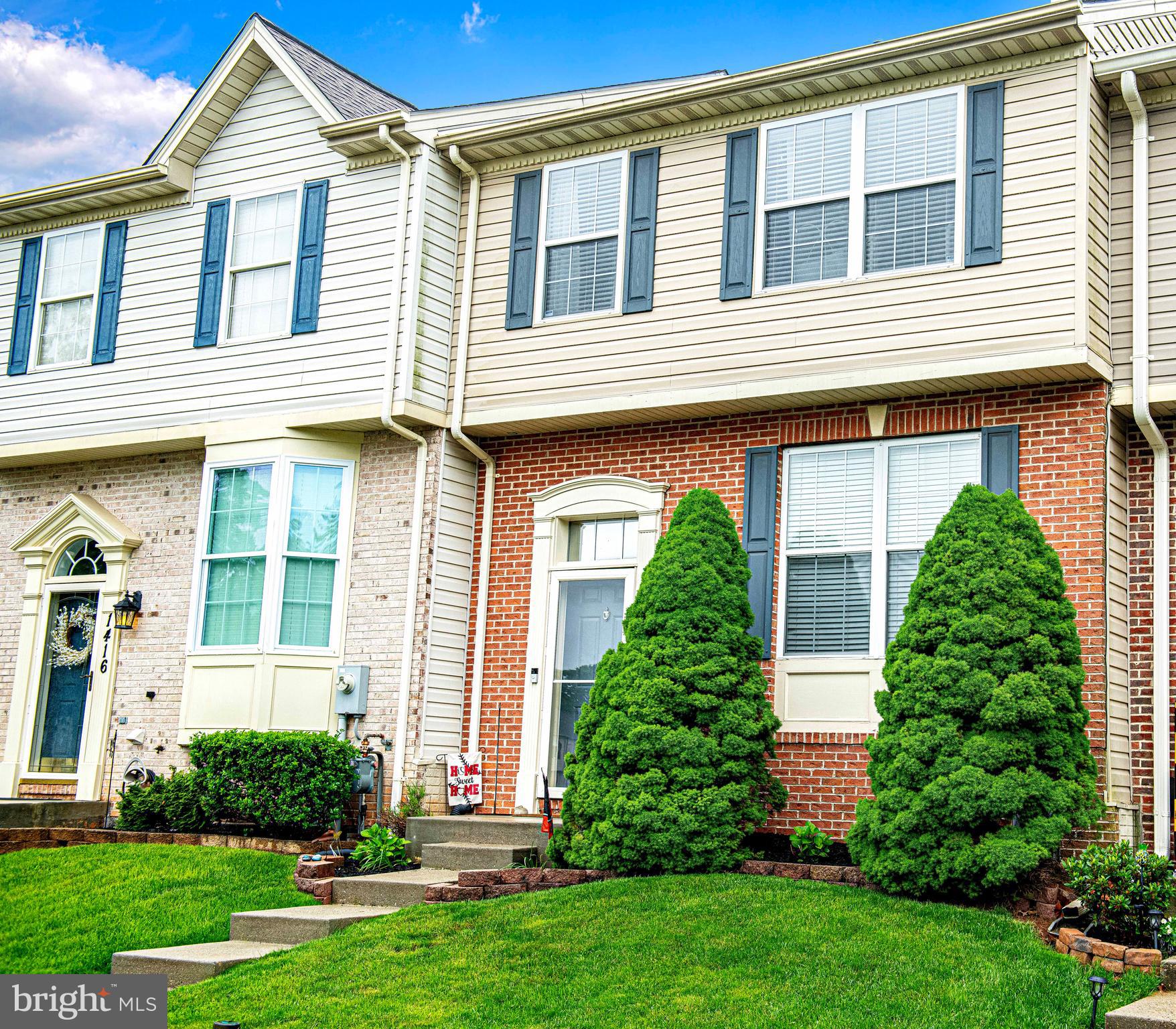 Brick and vinyl siding