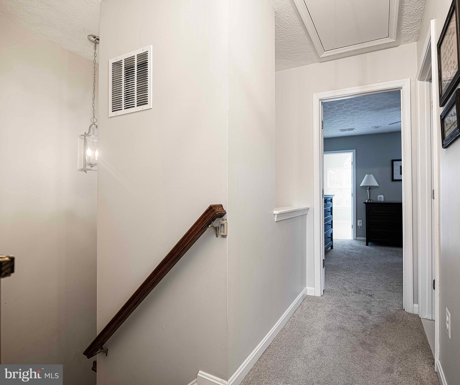 1418 Roman Ridge Way Bel Air, MD 21014 - Photo 26 of 43 Upper level hallway - pull down attic stairs