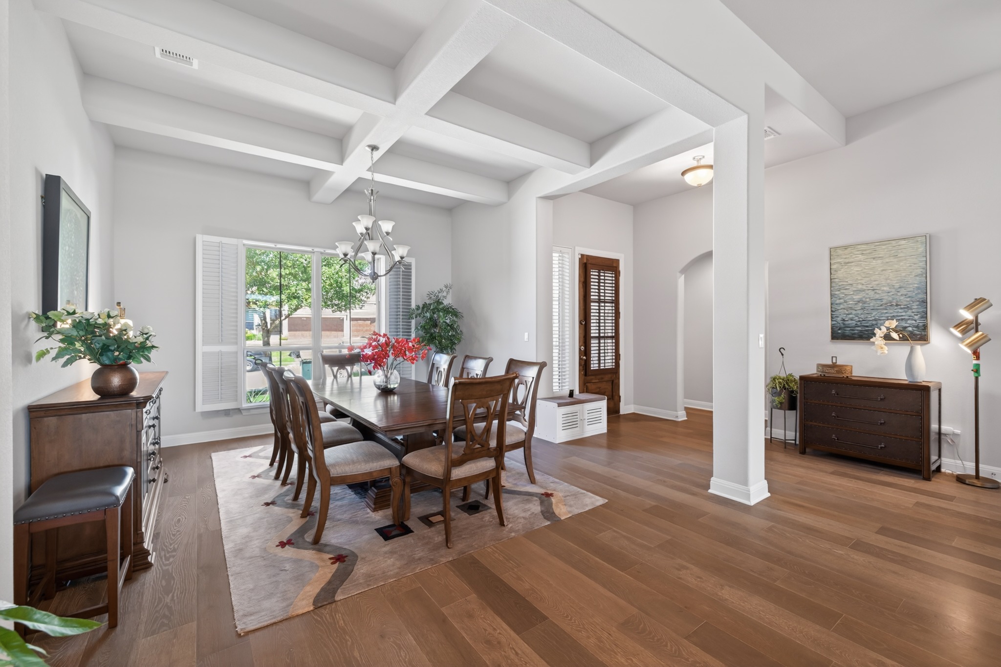 4105 Haight Street Round Rock, TX 78681 - Photo 4 of 40 a view of a dining room with furniture and wooden floor