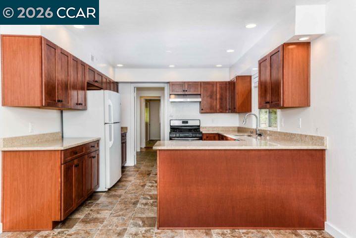 2648 Reliez Valley Road Martinez, CA 94553 - Photo 12 of 38 a kitchen with stainless steel appliances granite countertop a stove a sink and a refrigerator