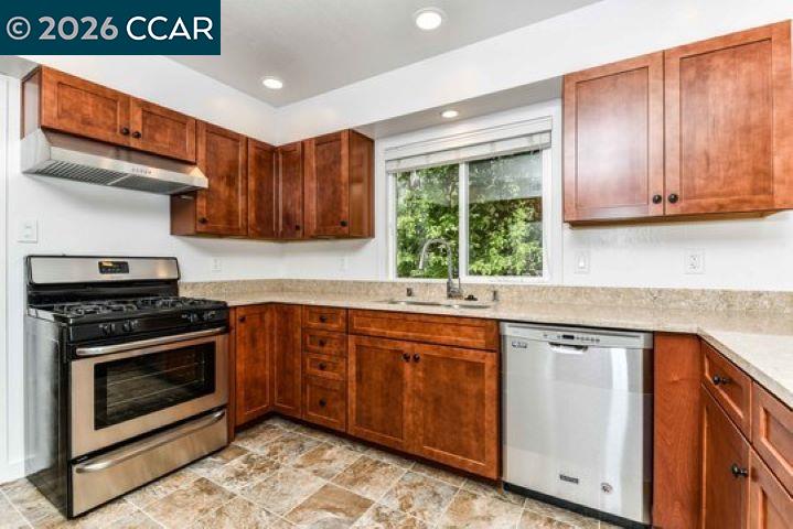 2648 Reliez Valley Road Martinez, CA 94553 - Photo 14 of 38 a kitchen with stainless steel appliances granite countertop a stove a sink and a microwave
