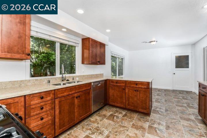 2648 Reliez Valley Road Martinez, CA 94553 - Photo 15 of 38 a kitchen with stainless steel appliances granite countertop a sink stove and cabinets