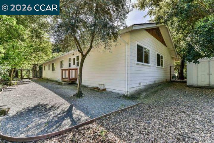 2648 Reliez Valley Road Martinez, CA 94553 - Photo 25 of 38 a view of a house with a yard