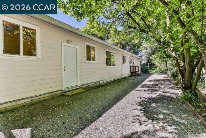2648 Reliez Valley Road Martinez, CA 94553 - Photo 26 of 38 a front view of a house with garden