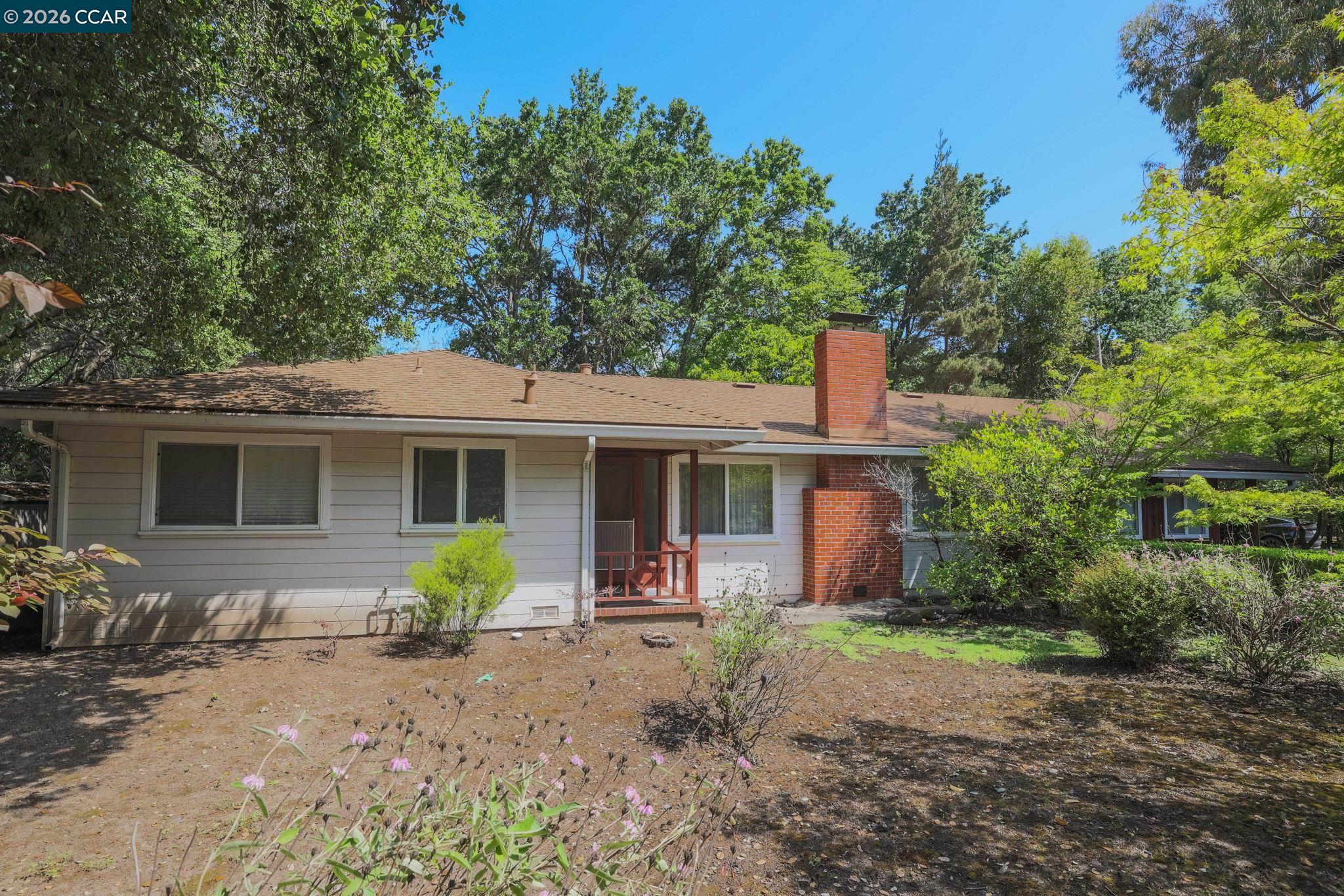 2648 Reliez Valley Road Martinez, CA 94553 - Photo 30 of 38 a view of a house with a yard