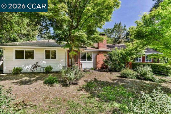 2648 Reliez Valley Road Martinez, CA 94553 - Photo 3 of 38 a front view of a house with a yard