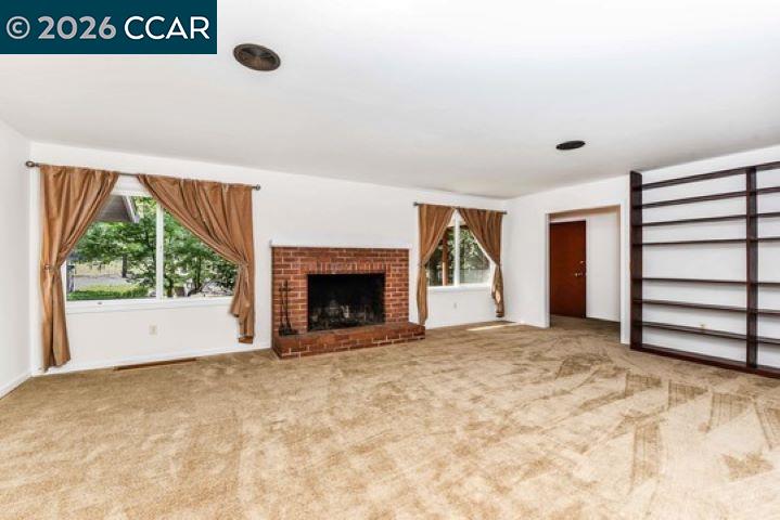 2648 Reliez Valley Road Martinez, CA 94553 - Photo 4 of 38 a view of empty room with a fireplace