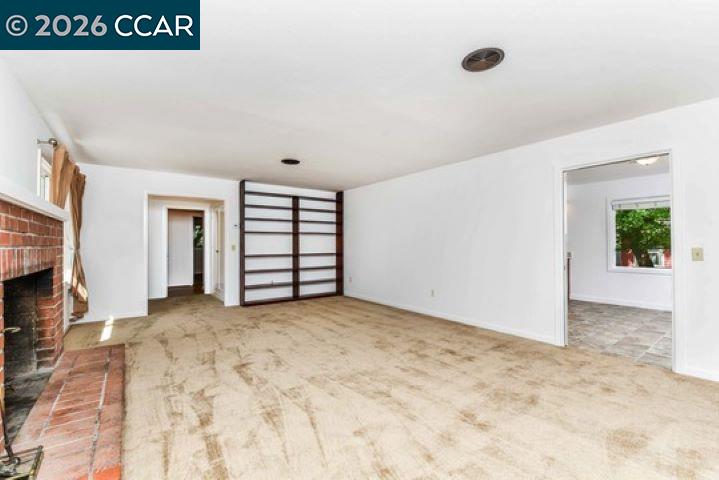 2648 Reliez Valley Road Martinez, CA 94553 - Photo 5 of 38 a view of an empty room with a window