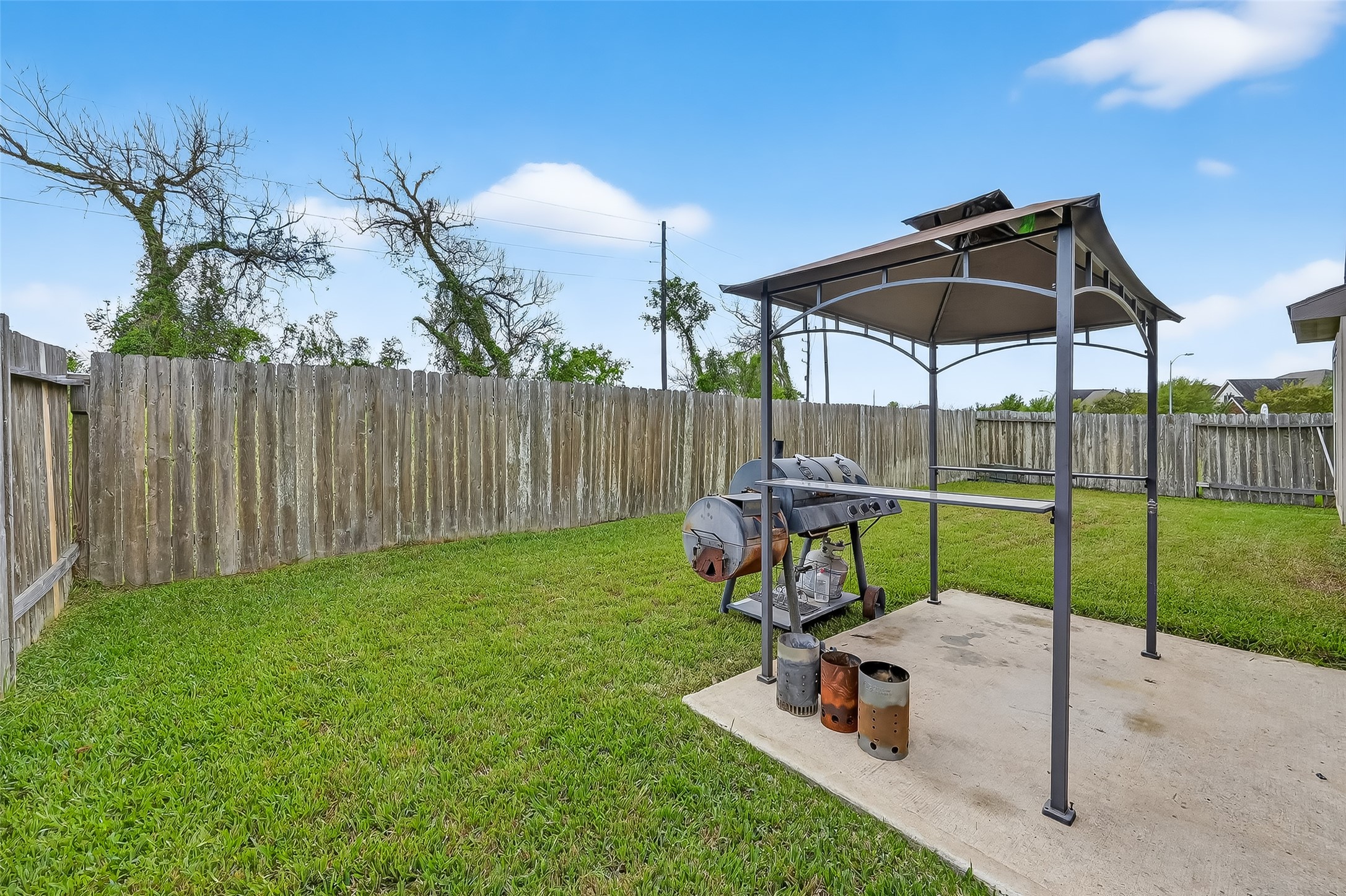 5919 Micah Lane Rosenberg, TX 77471 - Photo 36 of 39 A spacious backyard with a lush lawn and patio, ideal for entertaining or relaxing outdoors