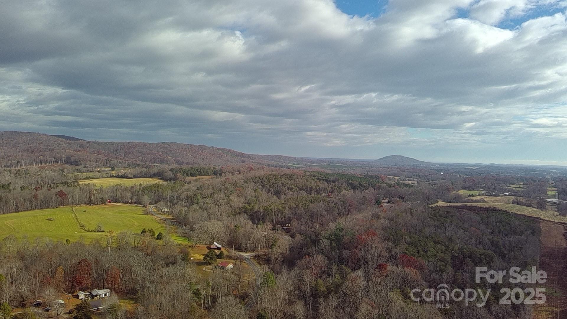 0 Linneys Mill Road Union Grove, NC 28689 - Photo 8 of 12 a view of a lake with a mountain in the background