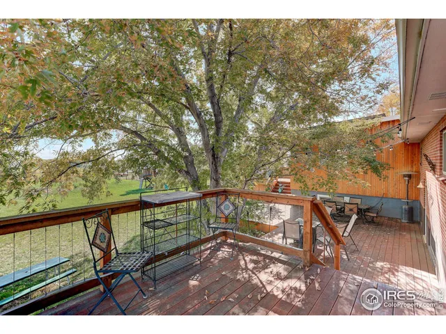 a view of a balcony with chairs