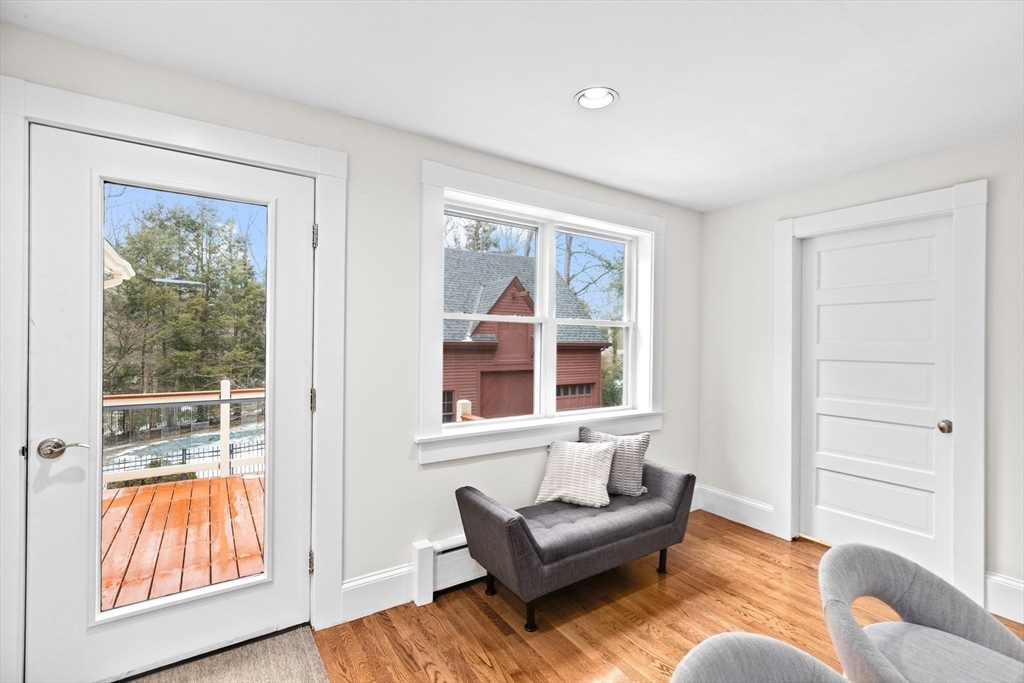 90 Brook Street Wellesley, MA 02482 - Photo 11 of 40 a living room with furniture and a window