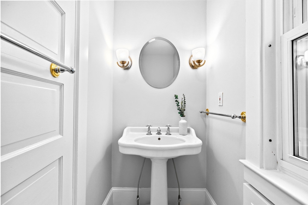 90 Brook Street Wellesley, MA 02482 - Photo 12 of 40 a bathroom with a sink and a mirror
