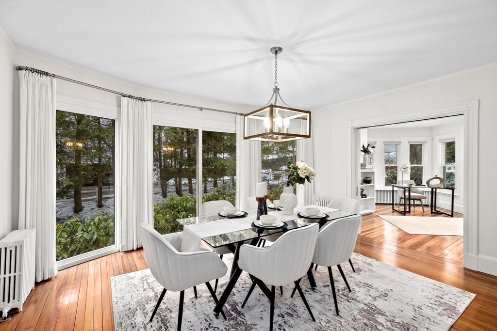 90 Brook Street Wellesley, MA 02482 - Photo 13 of 40 a view of a dining room with furniture window and wooden floor