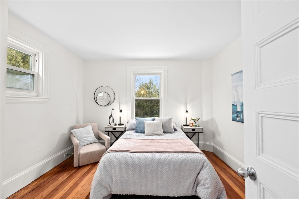 90 Brook Street Wellesley, MA 02482 - Photo 25 of 40 a bedroom with a bed and a window