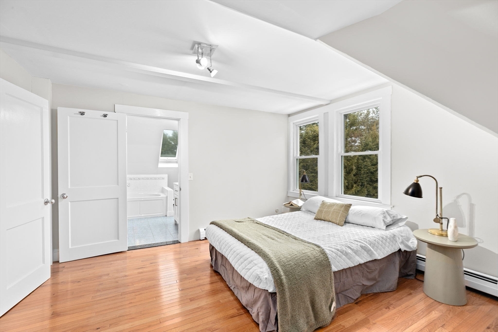 90 Brook Street Wellesley, MA 02482 - Photo 30 of 40 a bedroom with bed and window