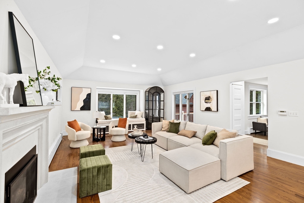 90 Brook Street Wellesley, MA 02482 - Photo 3 of 40 a living room with furniture fireplace and a flat screen tv