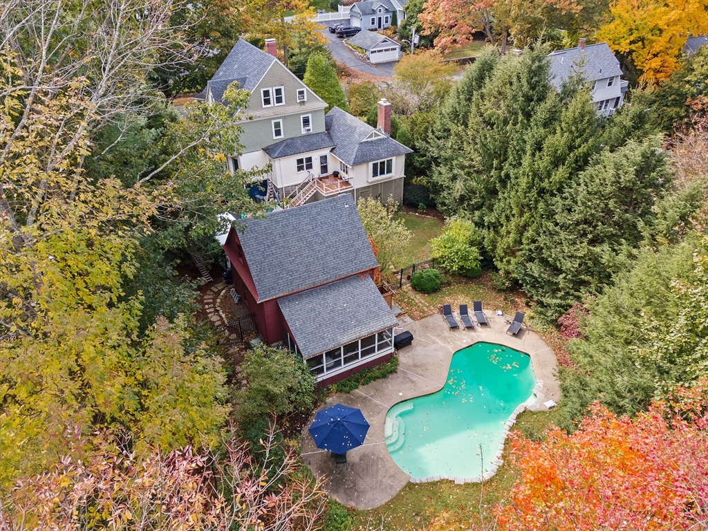 90 Brook Street Wellesley, MA 02482 - Photo 36 of 40 an aerial view of a house with a yard and trees