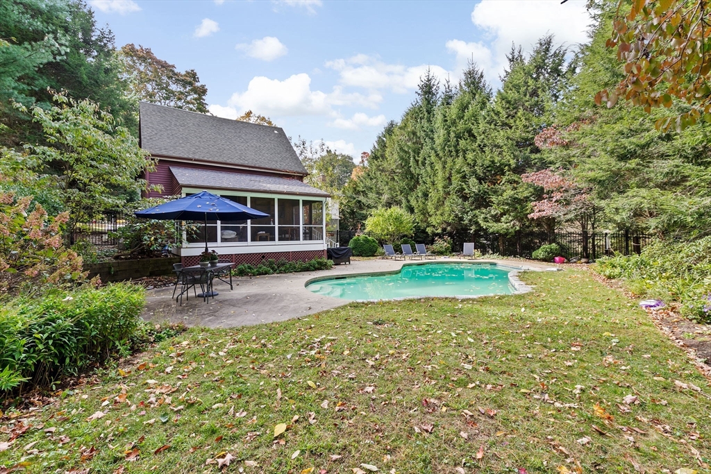 90 Brook Street Wellesley, MA 02482 - Photo 38 of 40 a view of a house with a yard