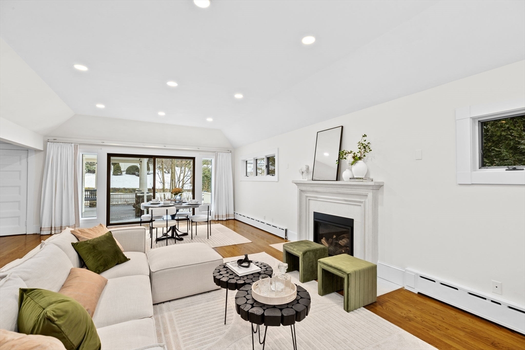 90 Brook Street Wellesley, MA 02482 - Photo 4 of 40 a living room with furniture fireplace and a table