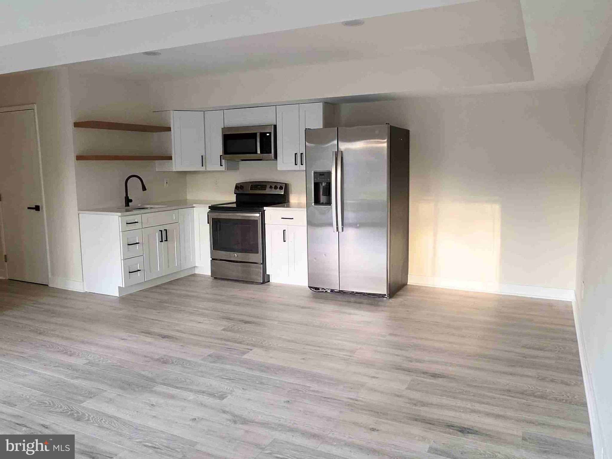 8229 Cagle Road Fort Washington, MD 20744 - Photo 7 of 21 OPEN KITCHEN