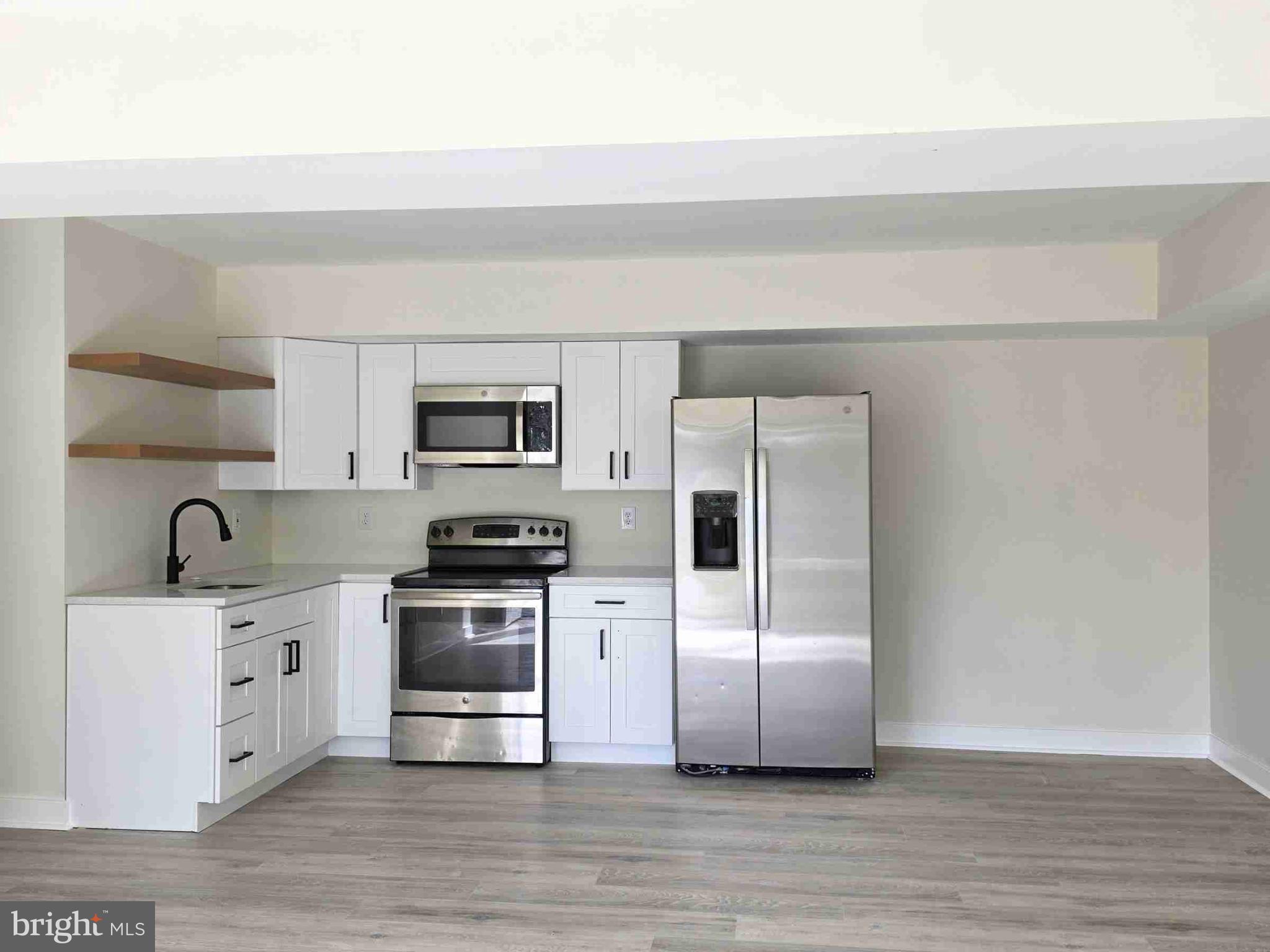 8229 Cagle Road Fort Washington, MD 20744 - Photo 8 of 21 OPEN KITCHEN