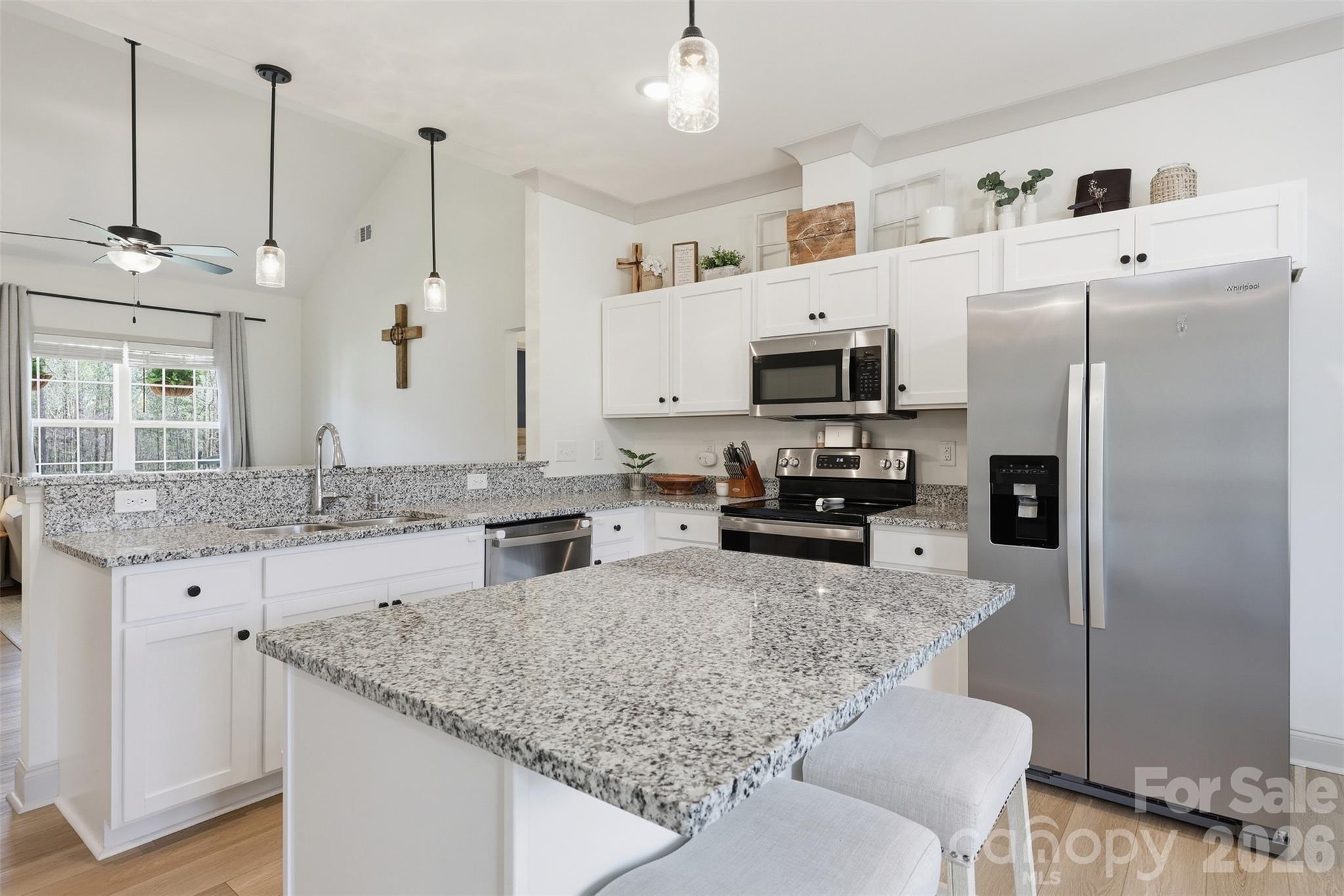 2909 Good Road Clover, SC 29710 - Photo 11 of 37 a kitchen with stainless steel appliances granite countertop a refrigerator a stove a sink and a granite counter tops