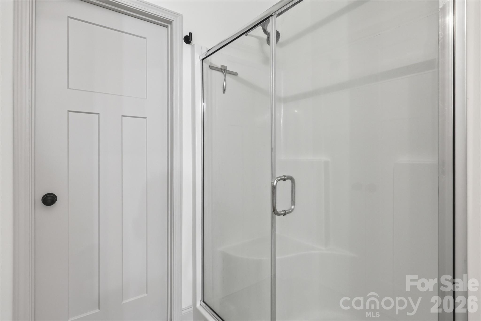 2909 Good Road Clover, SC 29710 - Photo 18 of 37 a bathroom with a glass shower door