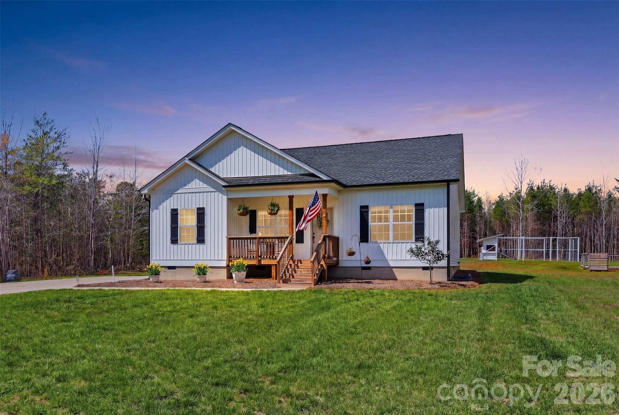 2909 Good Road Clover, SC 29710 - Photo 2 of 37 a front view of a house with garden