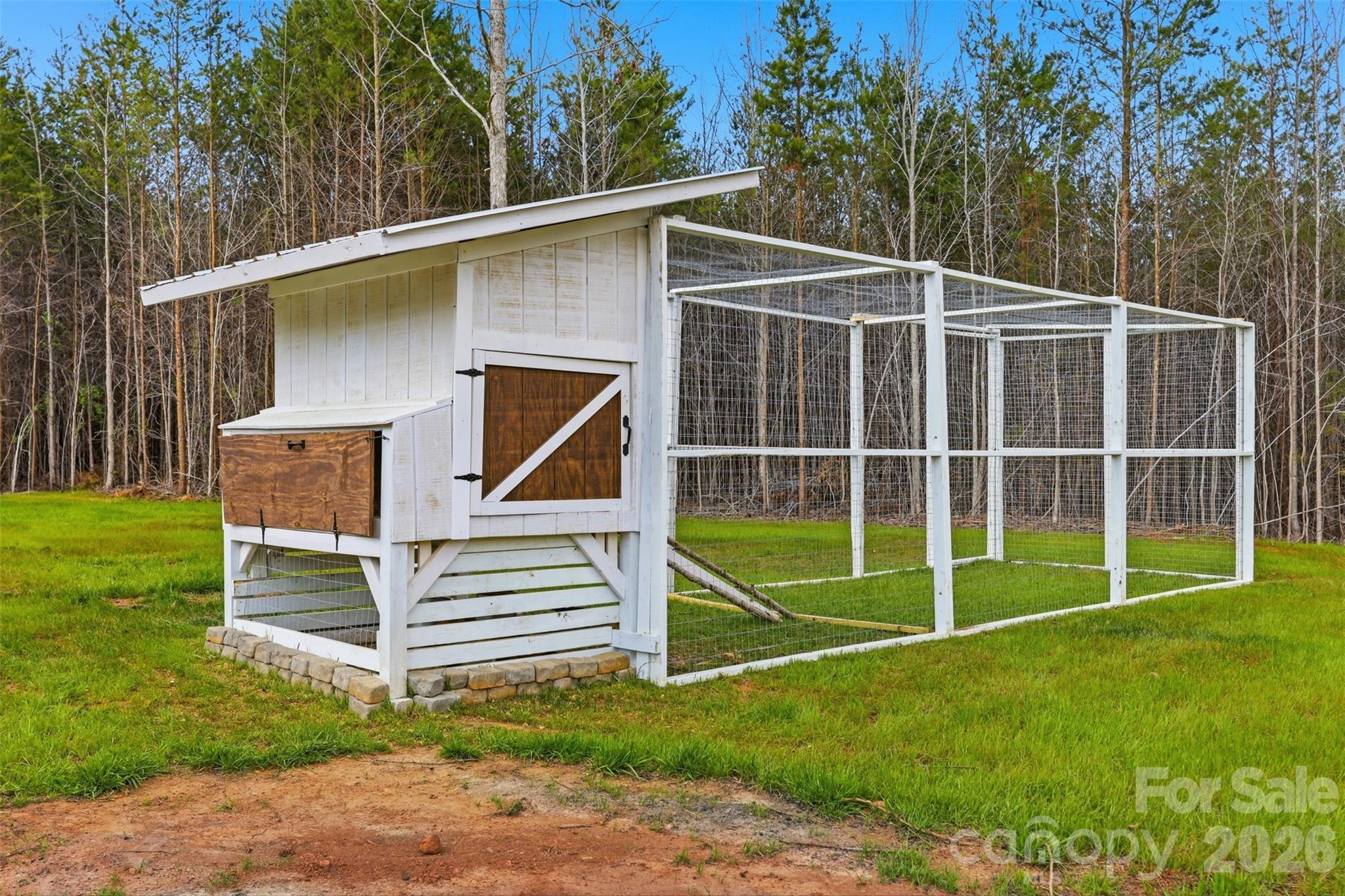 2909 Good Road Clover, SC 29710 - Photo 28 of 37 a view of a backyard with a small garden