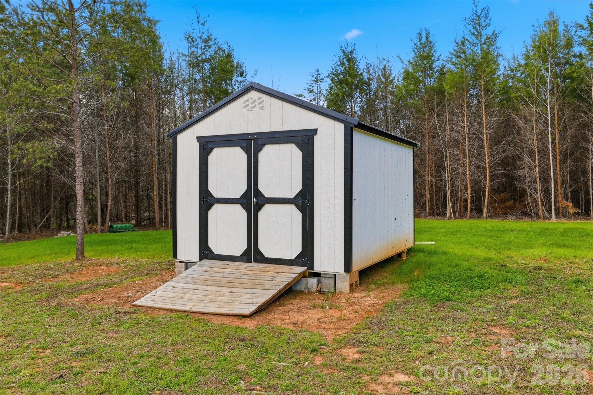 2909 Good Road Clover, SC 29710 - Photo 29 of 37 a view of a house with backyard and trees