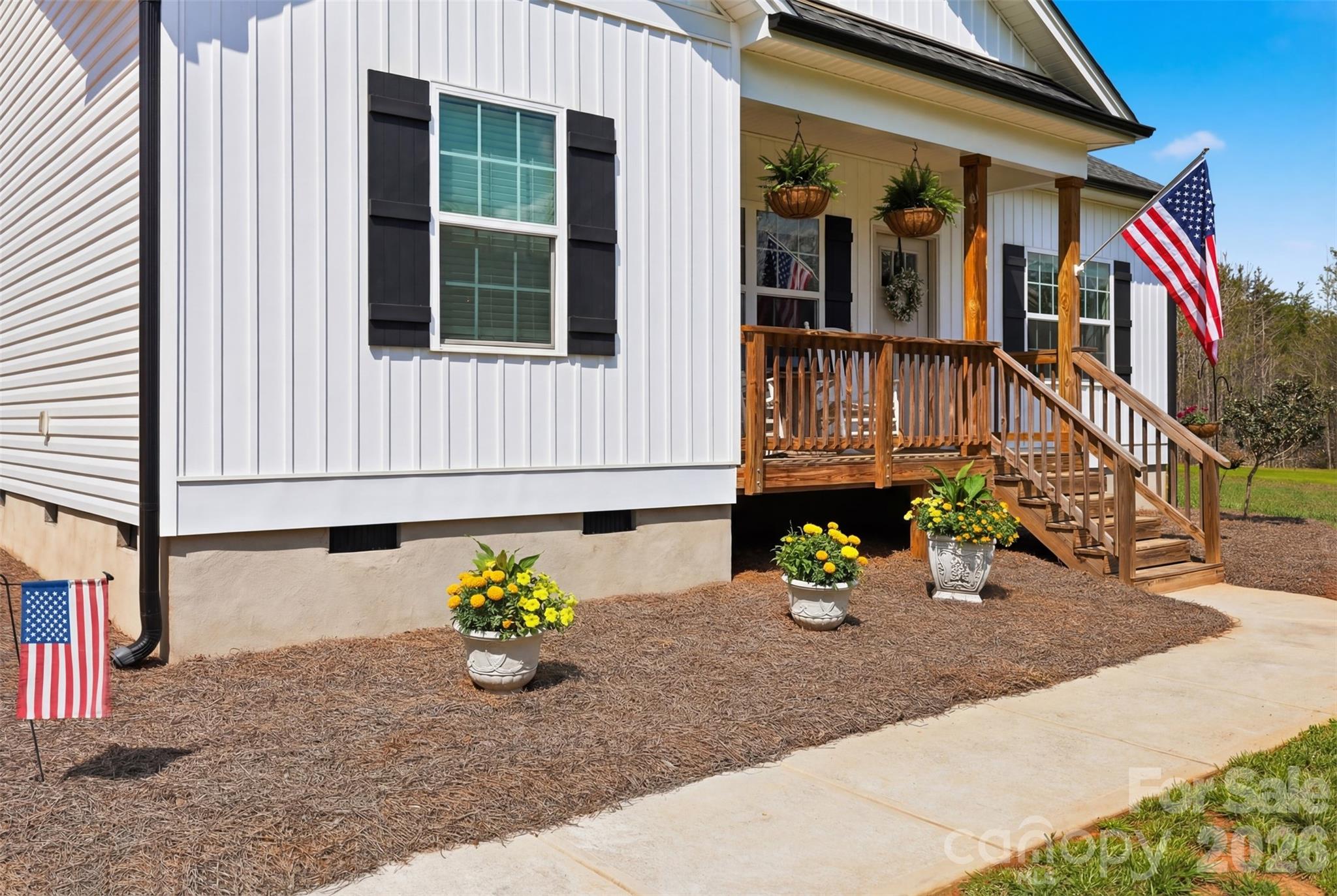 2909 Good Road Clover, SC 29710 - Photo 4 of 37 a view of a house with potted plants