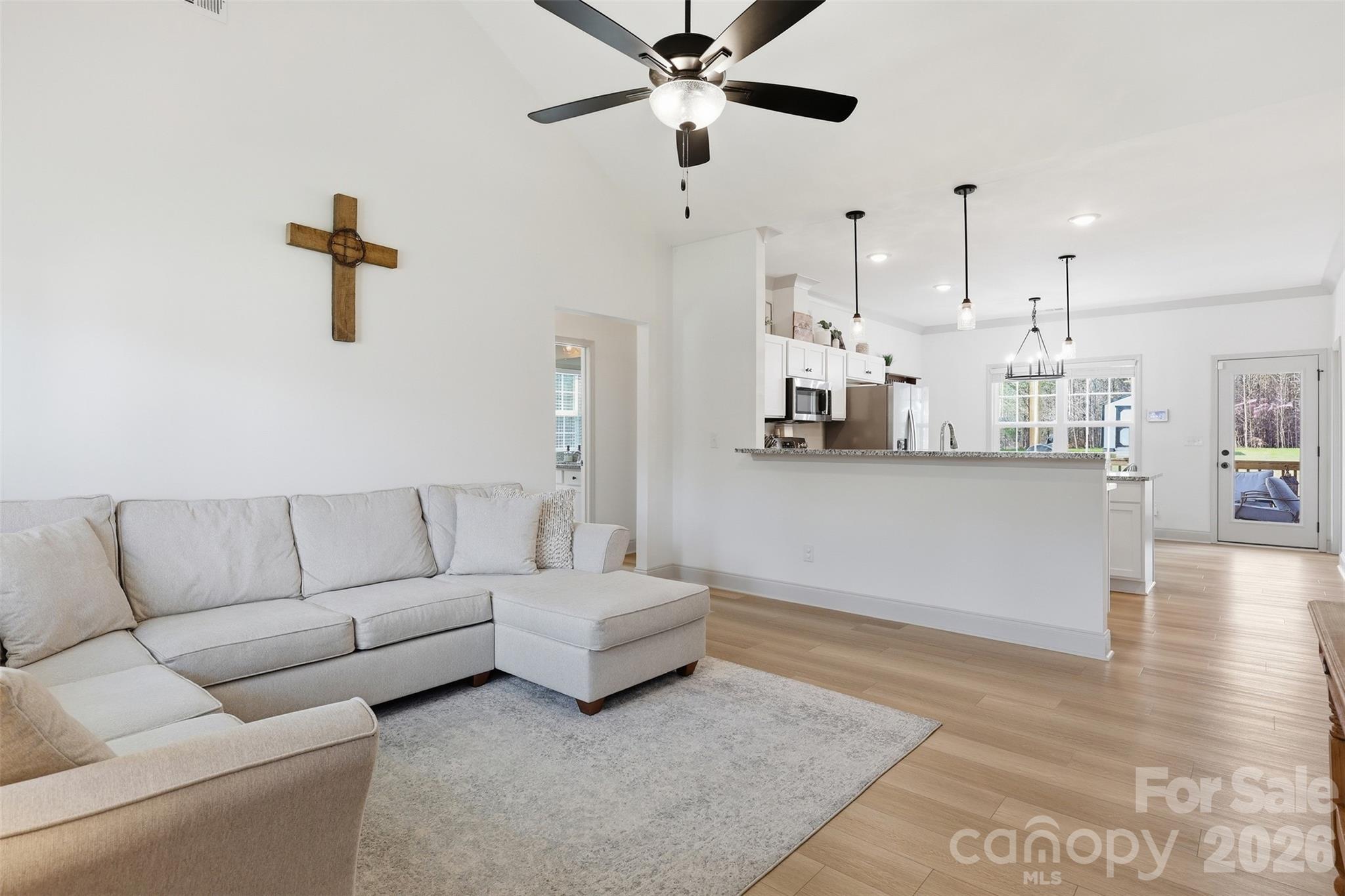 2909 Good Road Clover, SC 29710 - Photo 6 of 37 a living room with furniture and a wooden floor