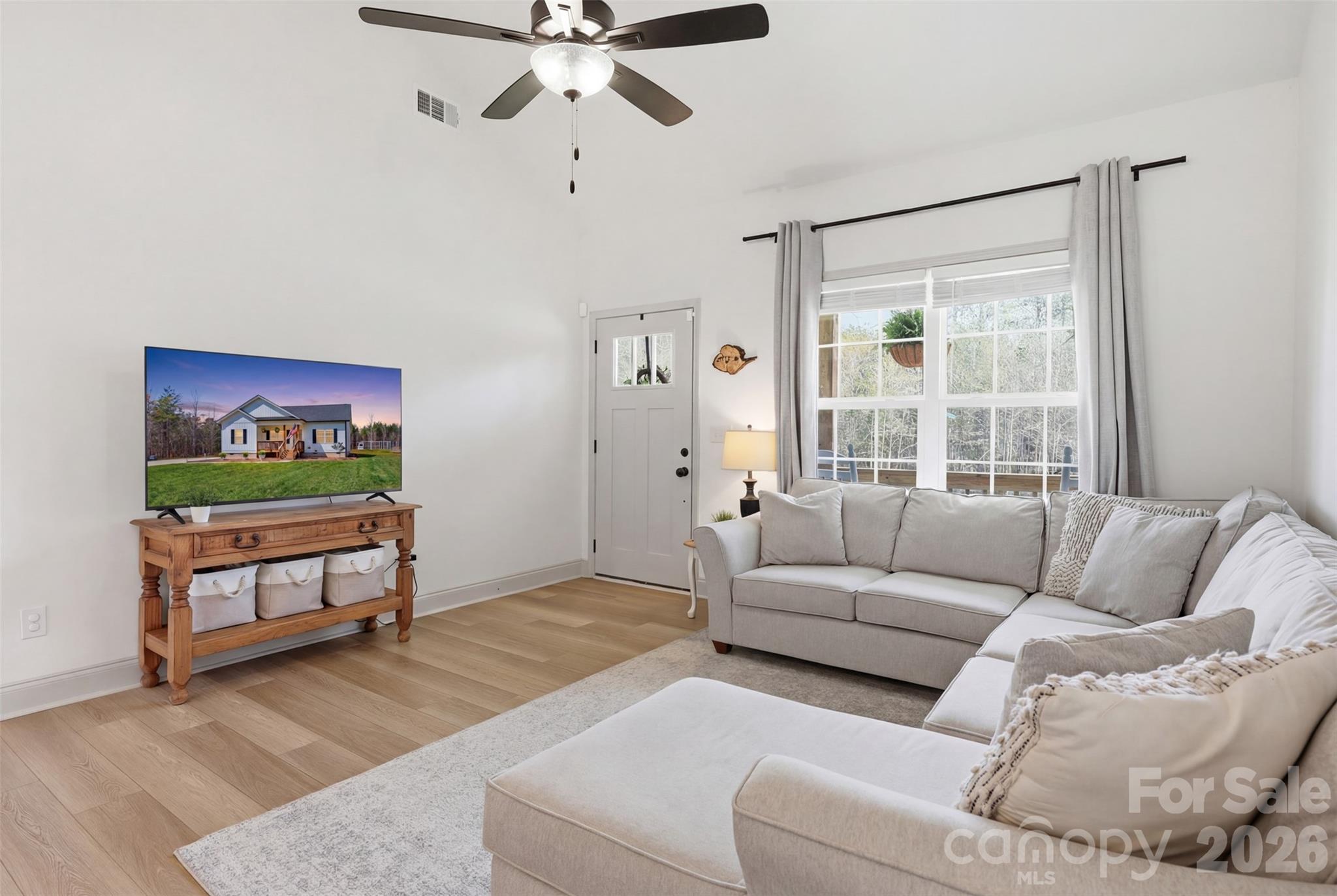 2909 Good Road Clover, SC 29710 - Photo 8 of 37 a living room with furniture and a flat screen tv