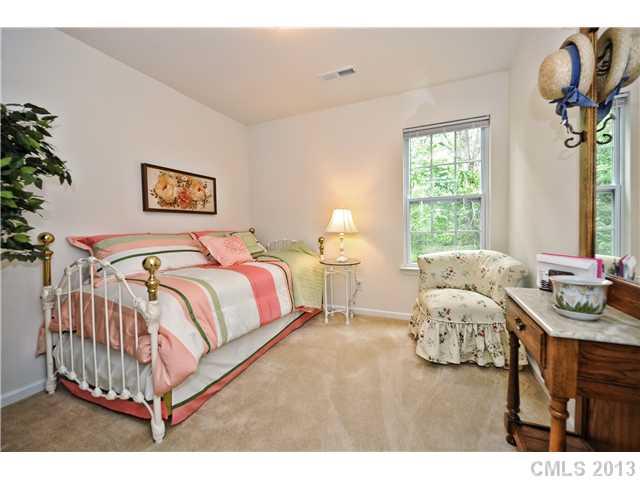 404 Morningside Road Charlotte, NC 28214 - Photo 11 of 14 a bedroom with a bed and window