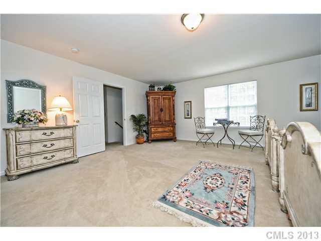 404 Morningside Road Charlotte, NC 28214 - Photo 13 of 14 a living room with furniture and a flat screen tv