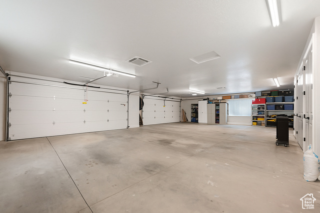 230 Boulder Way Leeds, UT 84746 - Photo 39 of 72 View of garage with two 18' foot doors and air-conditioning