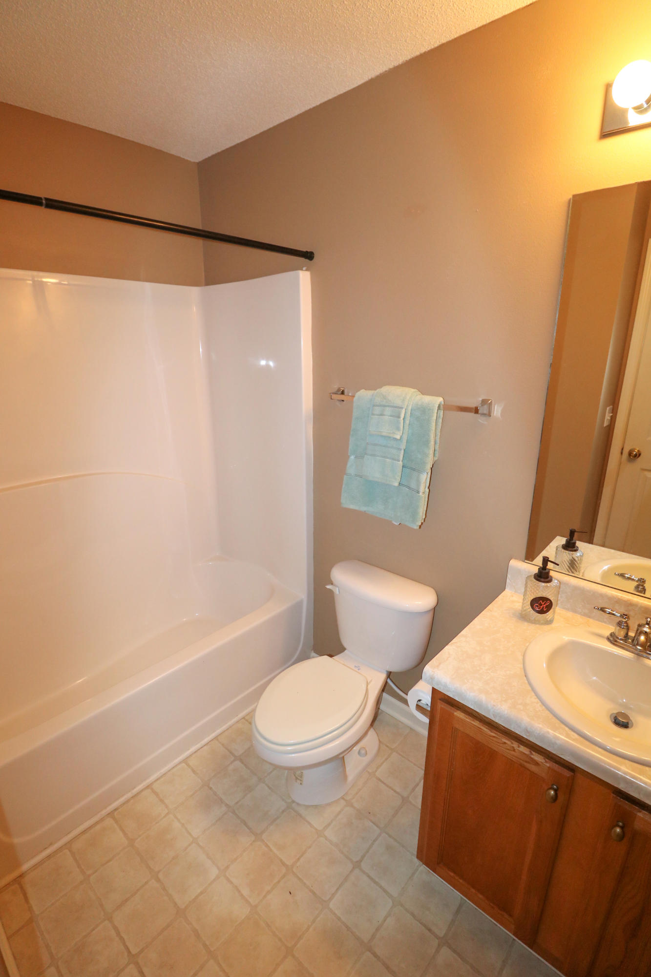 406 Crooked Pine Trail Crestview, FL 32539 - Photo 17 of 22 a bathroom with a sink toilet and shower