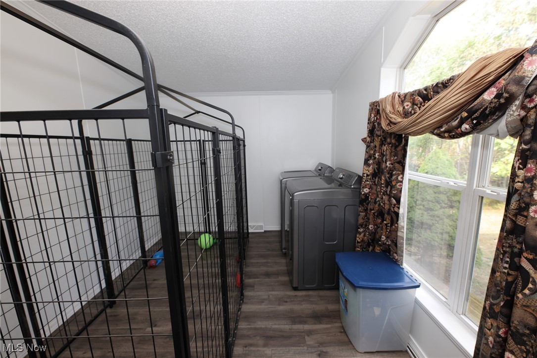 211 Gibson Road New Cumberland, WV 26047 - Photo 24 of 46 Storage room with independent washer and dryer