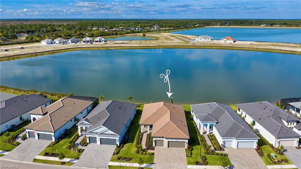 3993 Perseus Street Naples, FL 34120 - Photo 3 of 20 Aerial perspective of suburban area featuring a nearby body of water