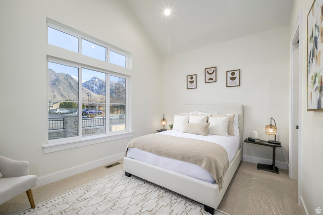 250 South Main Street, Unit 25 Alpine, UT 84004 - Photo 18 of 31 Bedroom with a mountain view, vaulted ceiling, light carpet, and recessed lighting