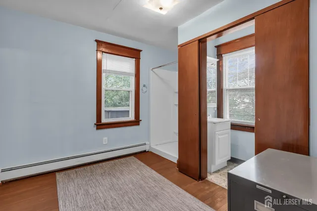 a bathroom with a shower and a toilet