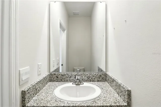 a bathroom with a vanity