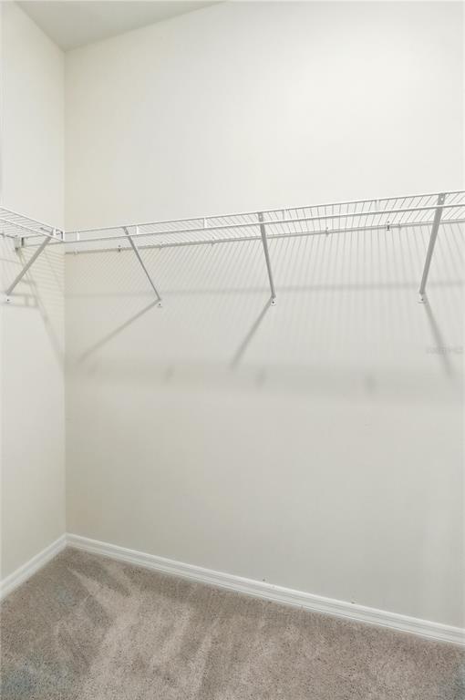 8931 Southwest 49th Circle Ocala, FL 34476 - Photo 13 of 42 a view of small space with racks on the wall