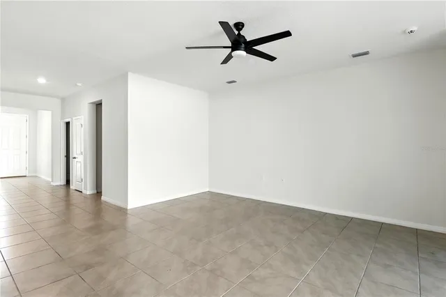 a kitchen with a sink appliances and cabinets