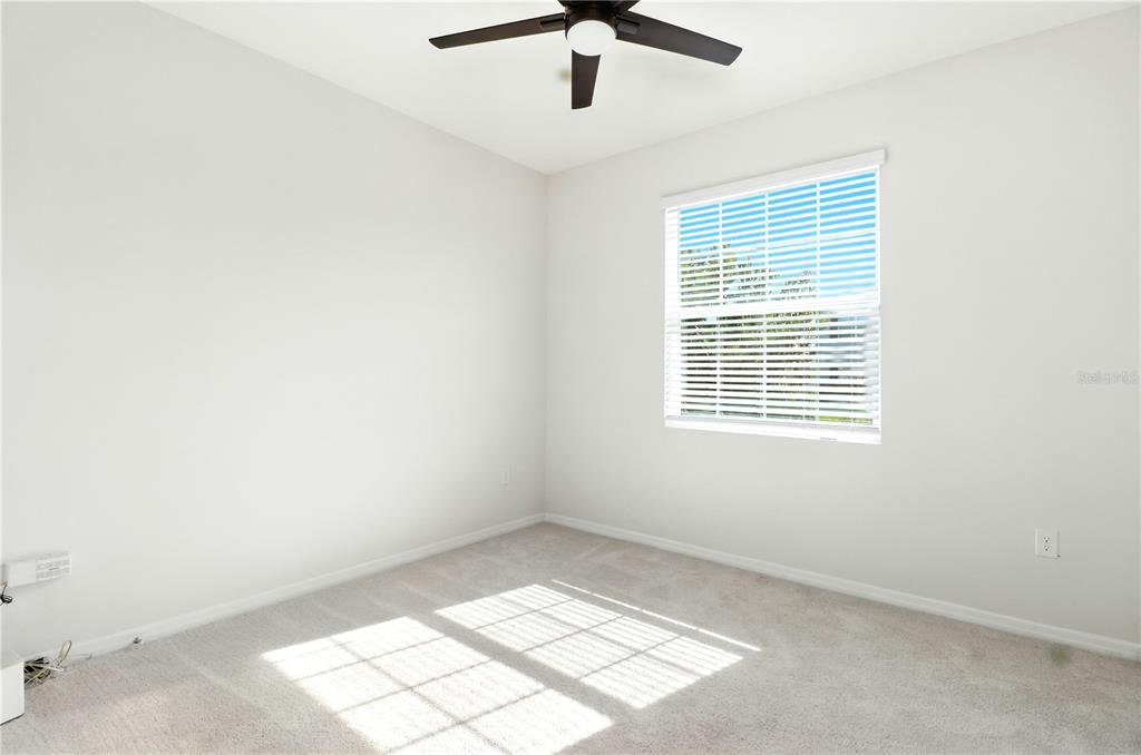 8931 Southwest 49th Circle Ocala, FL 34476 - Photo 34 of 42 an empty room with a window
