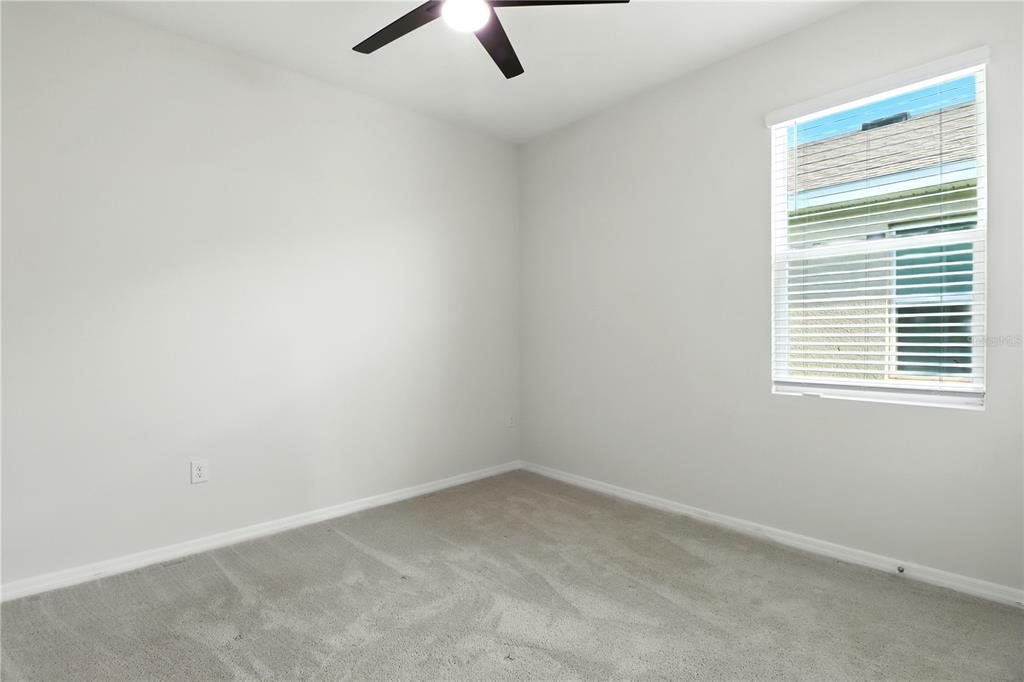 8931 Southwest 49th Circle Ocala, FL 34476 - Photo 37 of 42 an empty room with a window