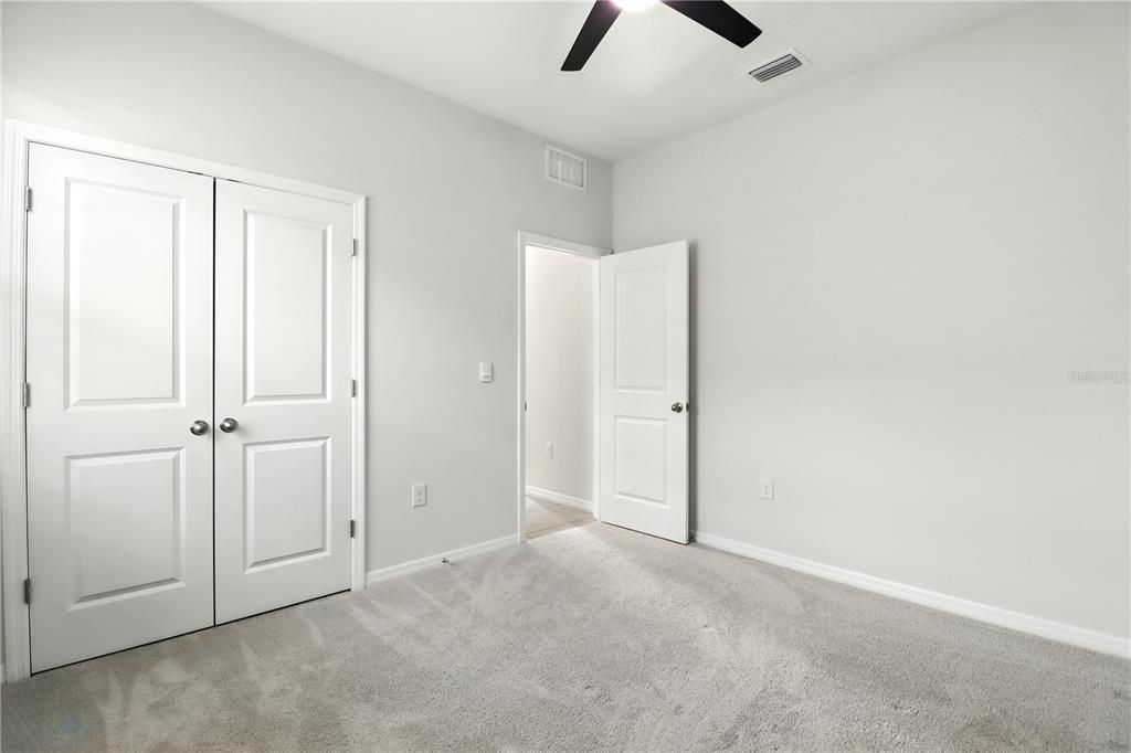 8931 Southwest 49th Circle Ocala, FL 34476 - Photo 6 of 42 a view of an empty room