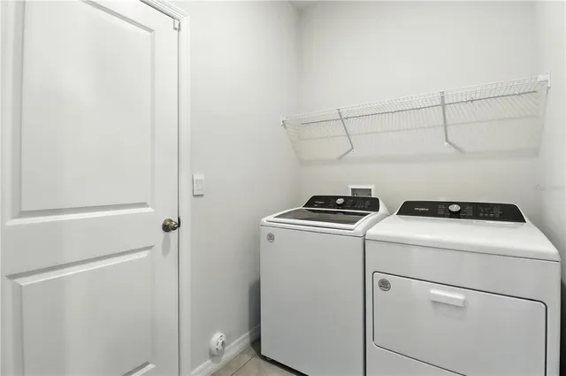 a view of a bathroom from the hallway